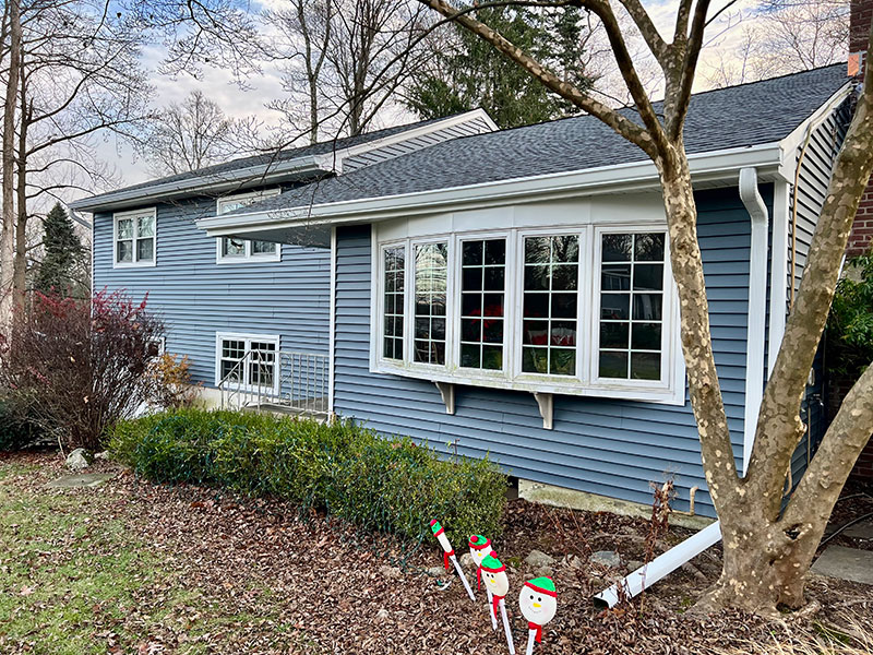 Blue House with New Roof, New Siding, New Windows, and Gutters Installed by Riga Home Pro in Greenwich, CT