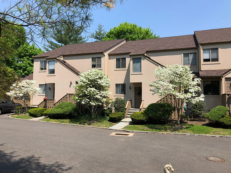 A brown roof in New Canaan, CT, showcasing professional roofing installation by Riga Home Pro, enhancing durability and curb appeal