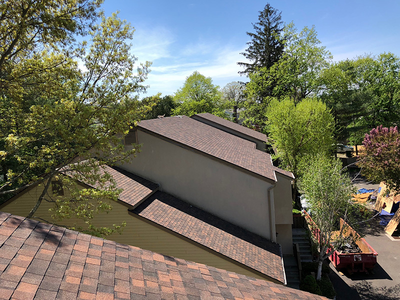 Light brown shingle roof installed by Riga Home Pro on a residential home in Old Greenwich, CT.