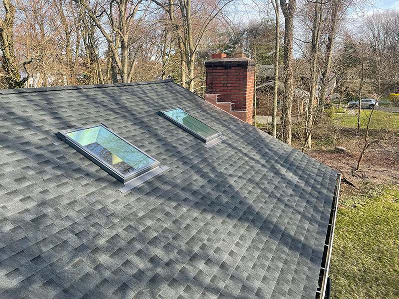 A New Roof with two skylights installed by Riga Home Pro in Shelton, CT