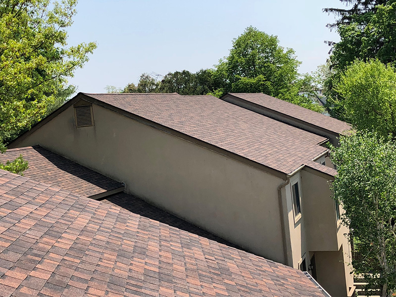 Top view of a home with a newly installed roof in Weston, CT, showcasing expert craftsmanship in roofing, siding, gutters, and windows by Riga Home Pro