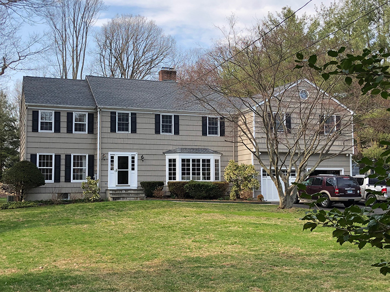 Residential home with gray shingles roof installed by Riga Home Pro in Westport, CT
