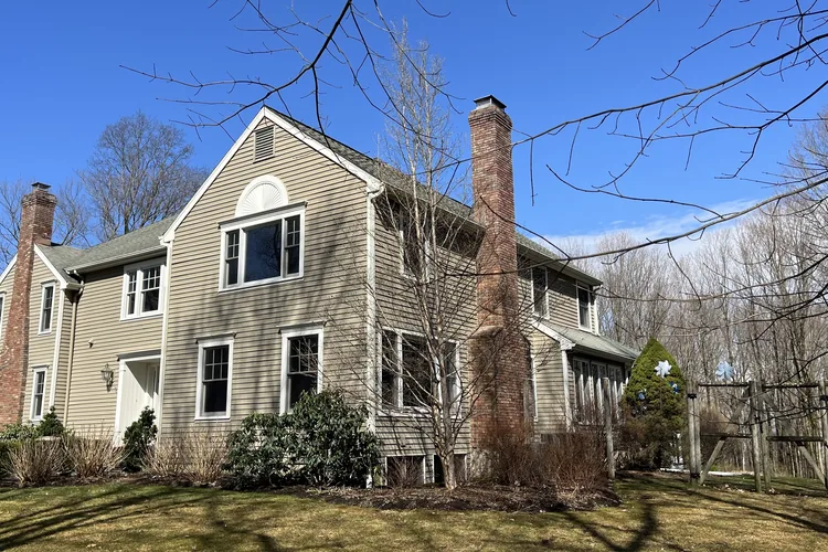 Completed roof replacement and seamless gutter installation in Ridgefield, CT