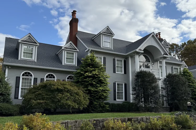 Completed roof replacement and seamless gutter installation in Weston, CT