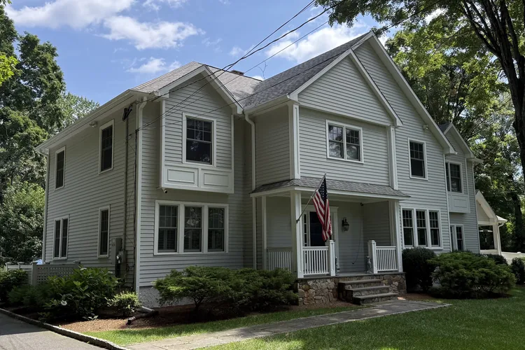 Completed roof replacement and seamless gutter installation in Westport, CT