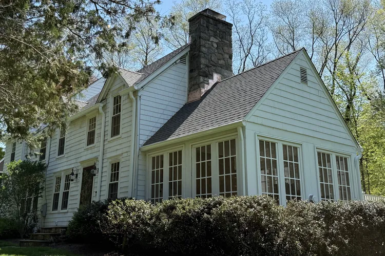 Completed roof replacement and seamless gutter installation in Wilton, CT