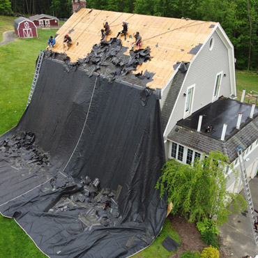 Old roof removal by top-rated local roofing company, Riga Home Pro, in Ridgefield, CT