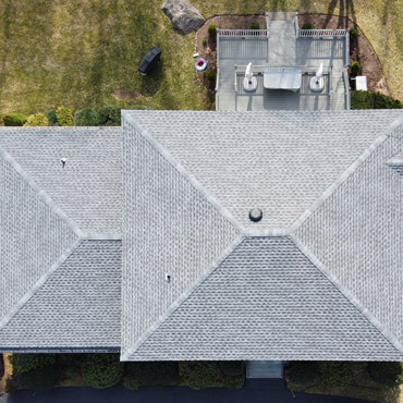 In pewter gray color roofing installation by top roofing contractors in Stamford, CT by Riga Home Pro