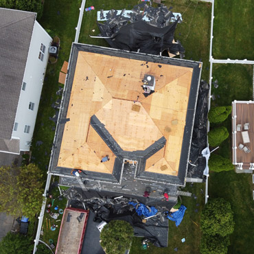 Roofing shingles removal by top-rated local roofing contractors in Norwalk, CT from Riga Home Pro