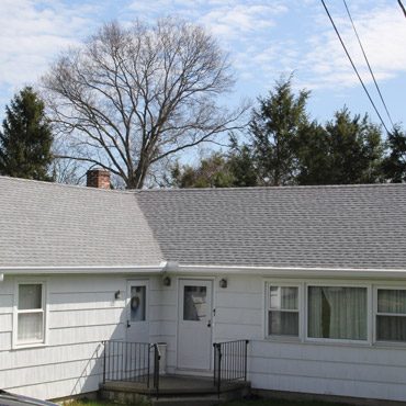 Completed GAF roof installation by local roofing contractors Riga Home Pro in Weston, CT